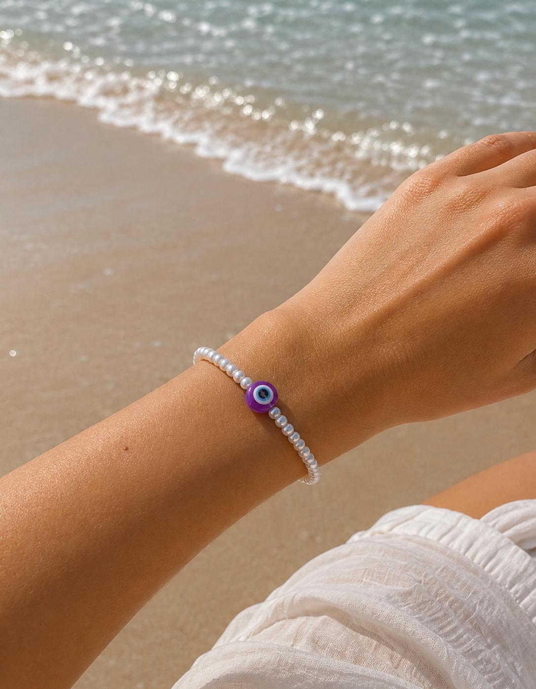 Pearl beaded purple evil eye bracelet