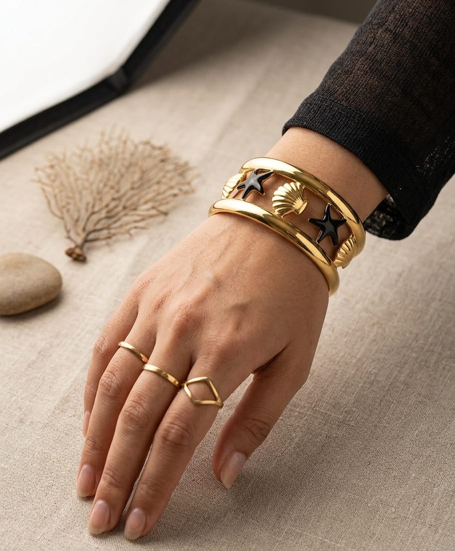 Women's gold-colour sea charm cuff bracelet with black starfish