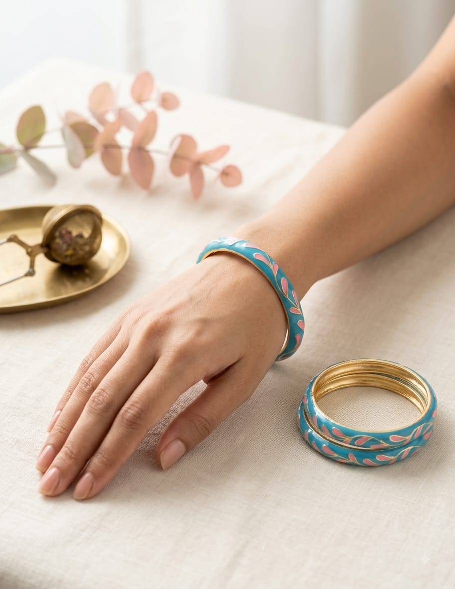 Blue enamel kada with pink leaf design