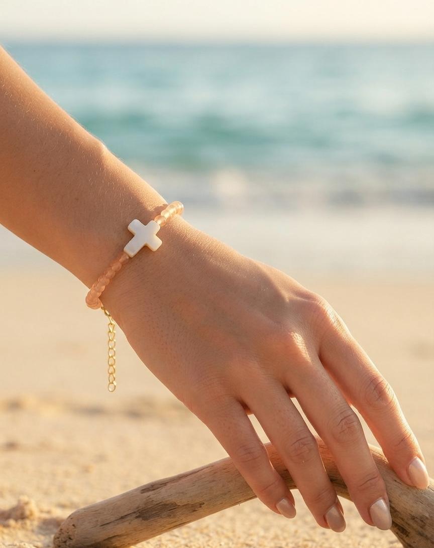 Peach beaded cross charm bracelet
