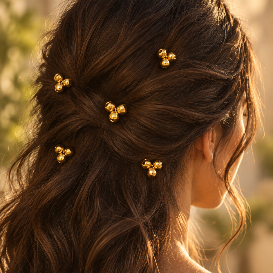 Gold bead cluster hair pins styled in hair