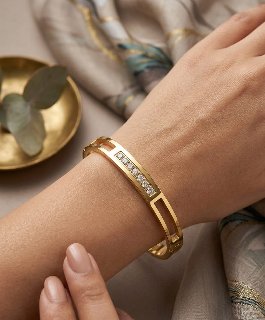 Gold-colour cuff bracelet with rectangular clear stone detail