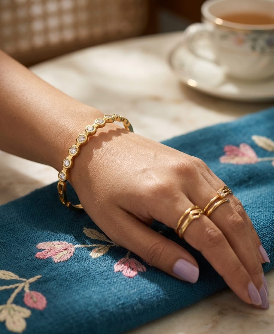 Gold-colour cuff bracelet with round clear stones