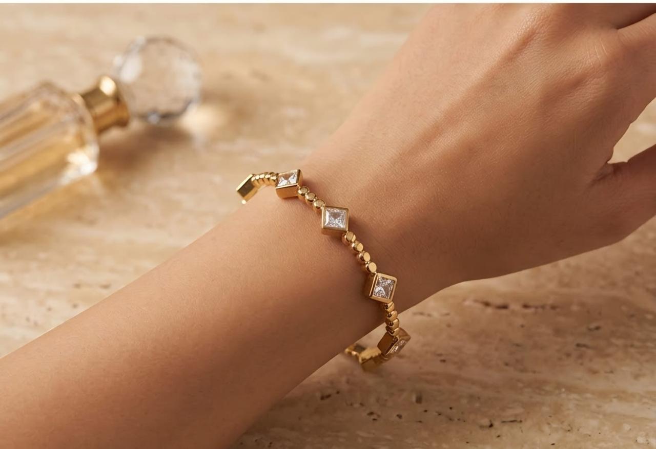 Gold-colour chain bracelet with square clear stones