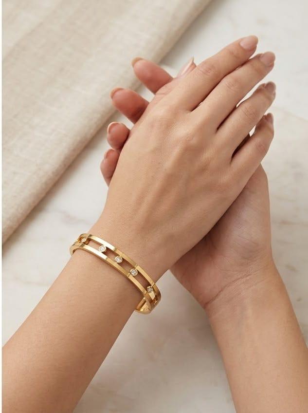 Gold-colour cuff bracelet with clear stones