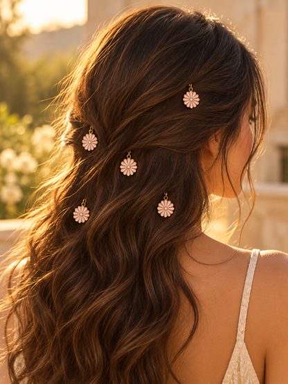 Pink daisy charm hair pins styled in hair