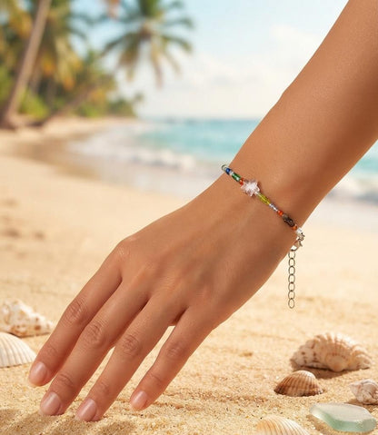Rainbow bead bracelet with pink star charm