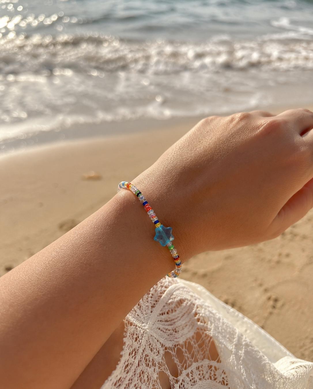 Rainbow beaded blue star charm bracelet
