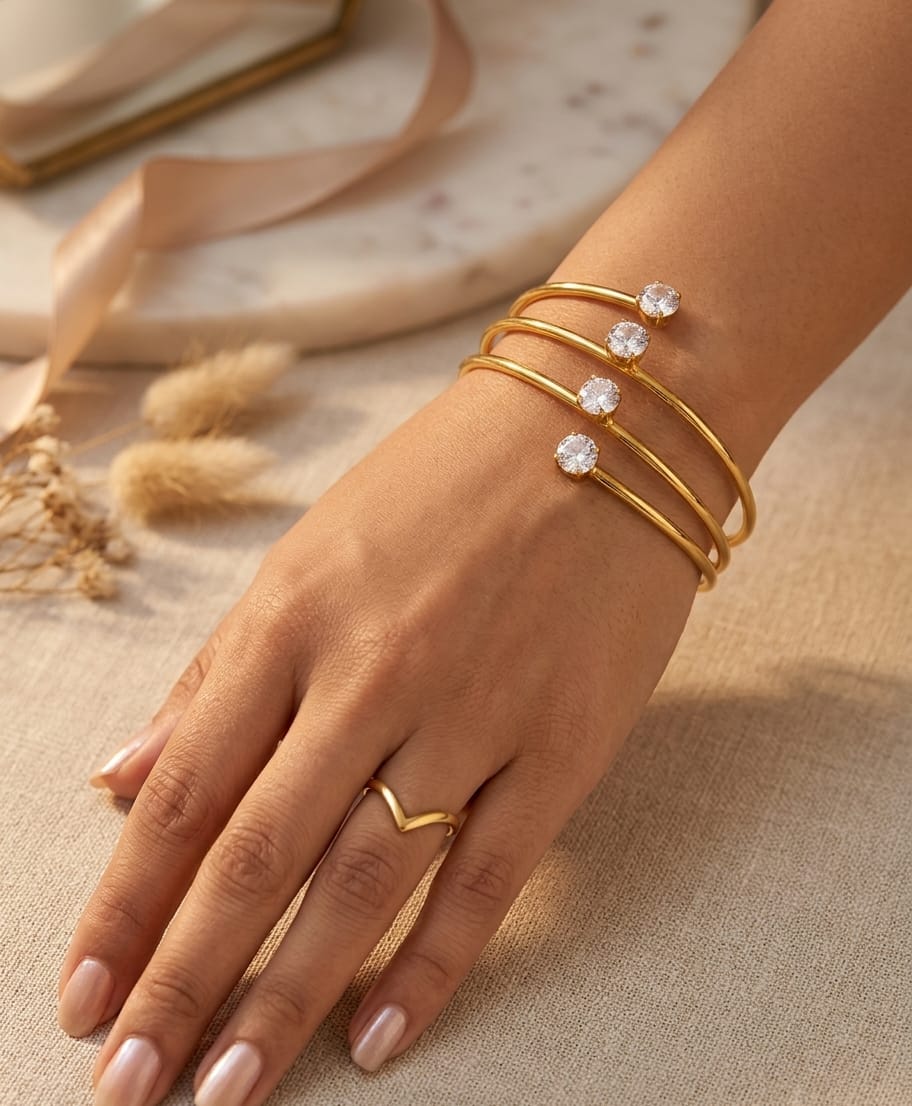 Women's gold-colour four stone kada bracelet